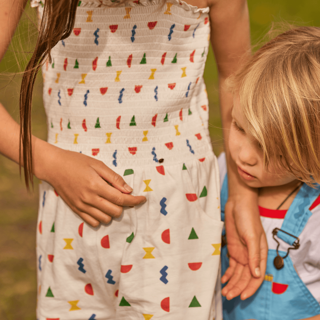 Let's Play Jersey Jumpsuit - Cream Multi - Dotty Dungarees Ltd
